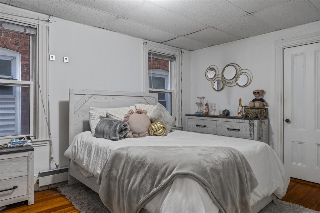 733 East 3rd Street Boston, MA 02127 - Photo 8 of 12 a bedroom with double bed and a window