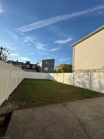 a view of a yard with an outdoor space