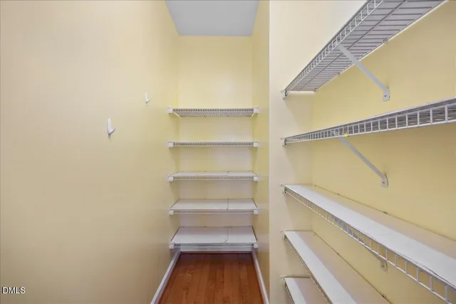 a utility room with cabinets washer and dryer