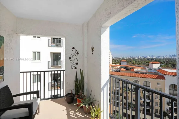 a view of a balcony with wooden floor