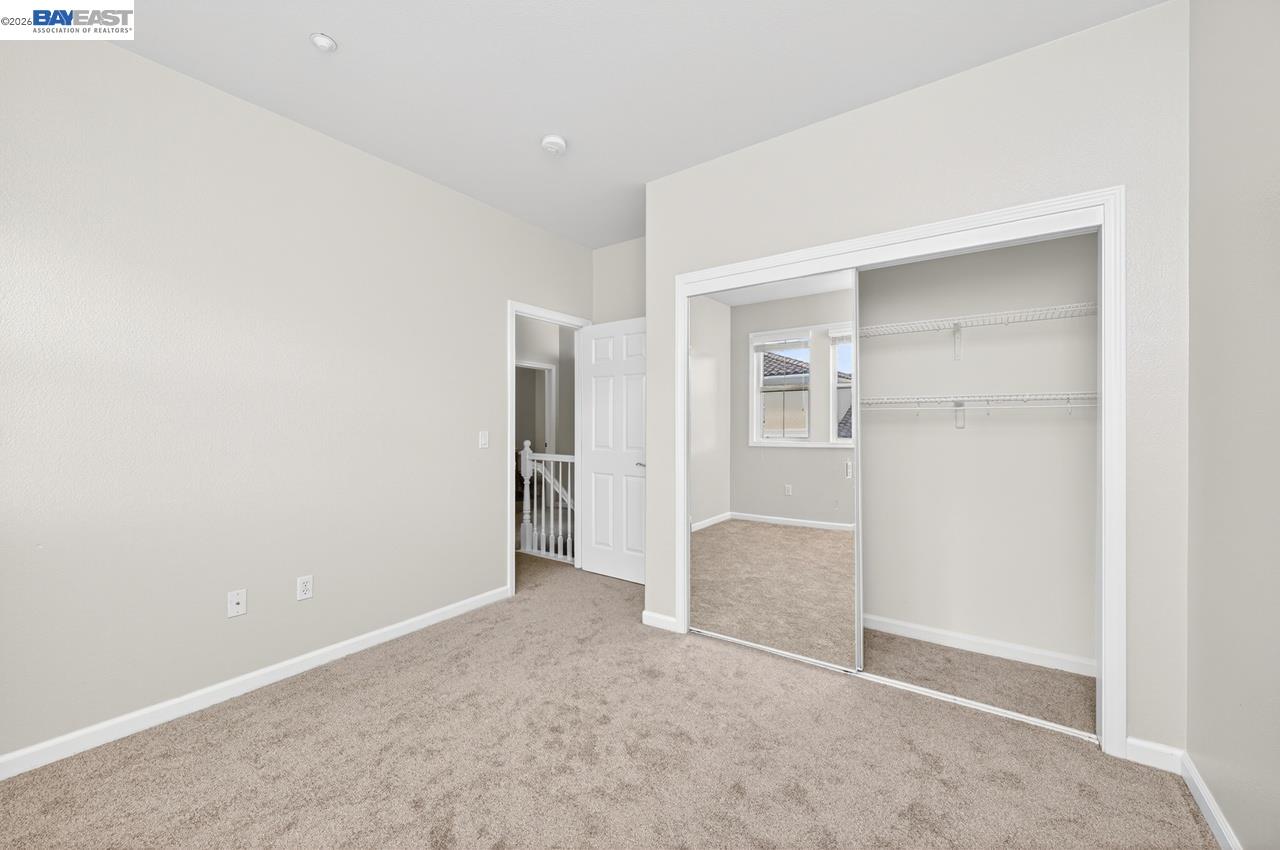 3391 Monaghan Street Dublin, CA 94568 - Photo 21 of 57 an empty room with windows