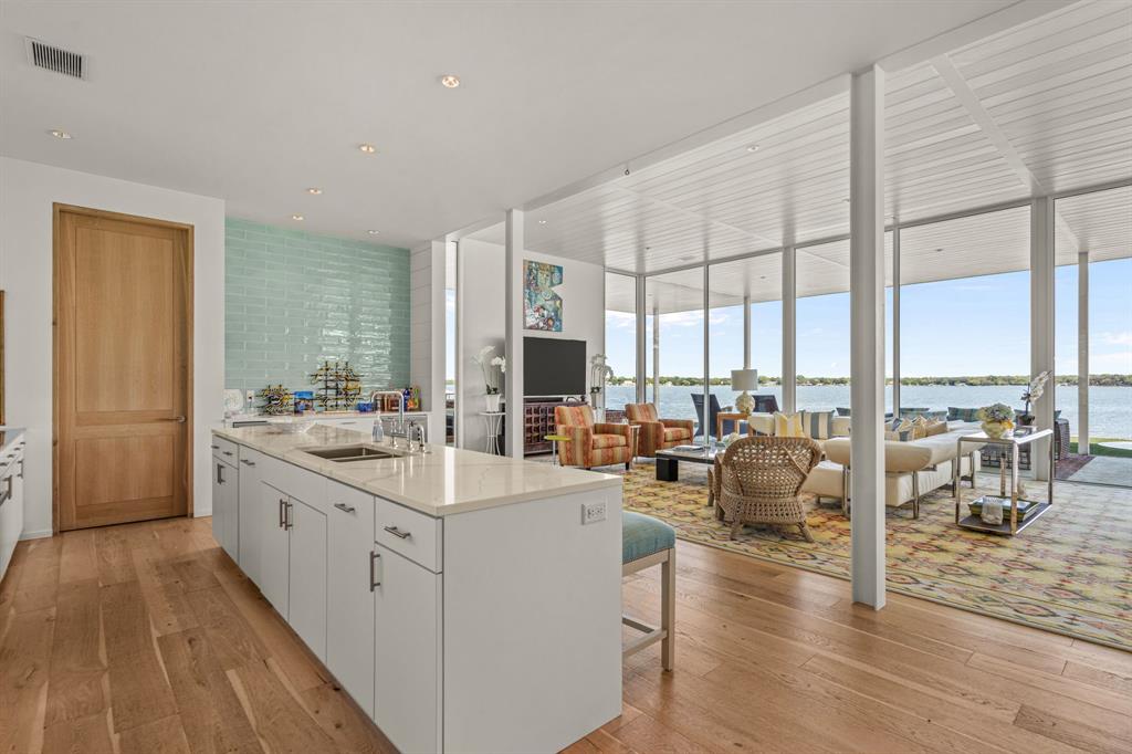 7145 Hickey Road Azle, TX 76020 - Photo 15 of 40 a large white room with a large window and furniture