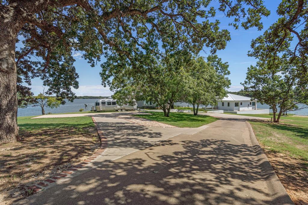 7145 Hickey Road Azle, TX 76020 - Photo 2 of 40 a view of a house with a yard