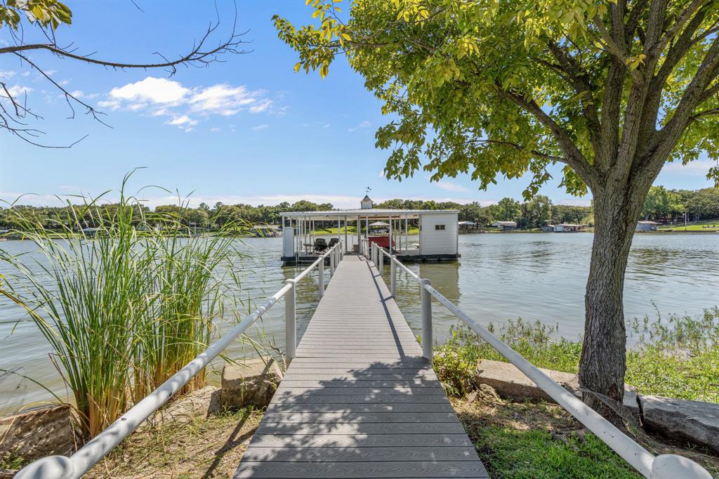 7145 Hickey Road Azle, TX 76020 - Photo 25 of 40 a view of a lake with a outdoor space