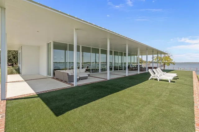 a view of a patio with swimming pool