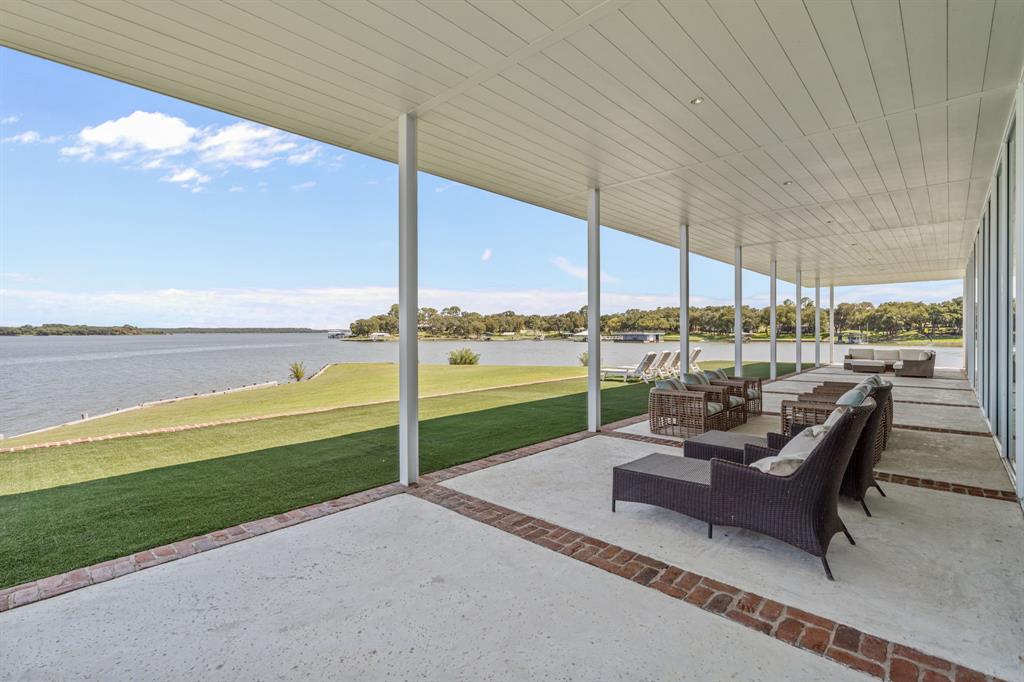 7145 Hickey Road Azle, TX 76020 - Photo 30 of 40 a building view with a garden and outdoor space