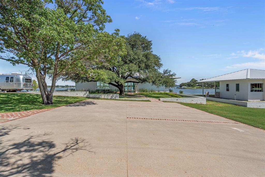 7145 Hickey Road Azle, TX 76020 - Photo 3 of 40 a view of street with houses