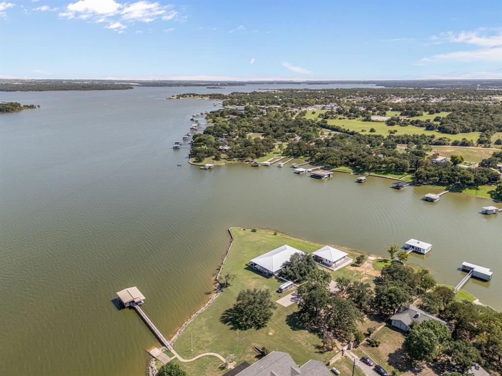 7145 Hickey Road Azle, TX 76020 - Photo 36 of 40 an aerial view of a houses with a lake view
