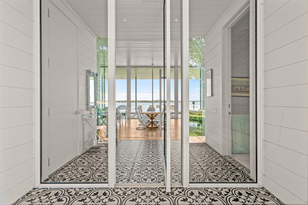 7145 Hickey Road Azle, TX 76020 - Photo 4 of 40 view of a living room and floor to ceiling window