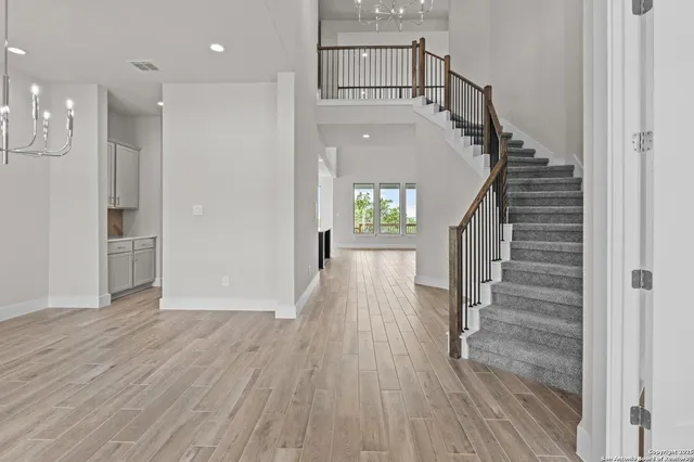 a view of entryway with wooden floor