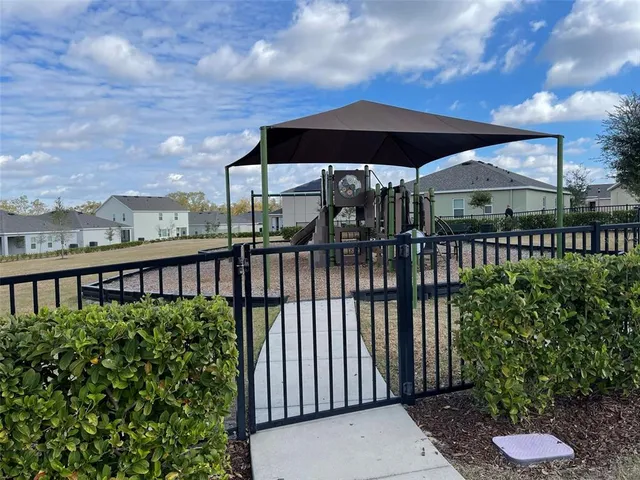 a view of a street with a balcony