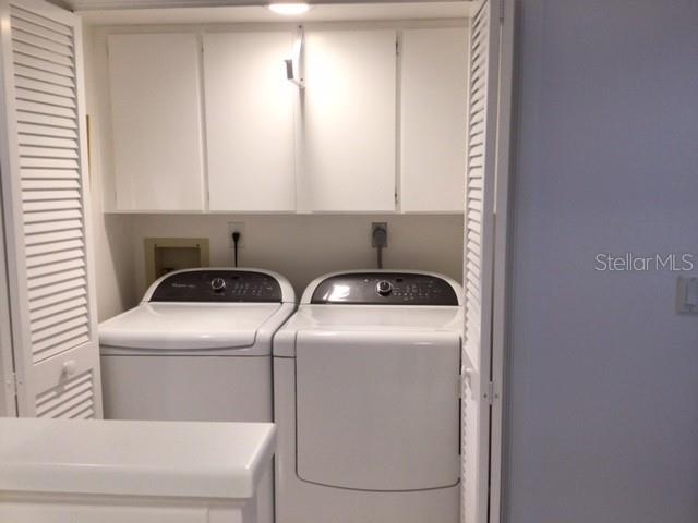 420 Gulf Boulevard, Unit 6 Boca Grande, FL 33921 - Photo 13 of 26 a utility room with dryer and washer