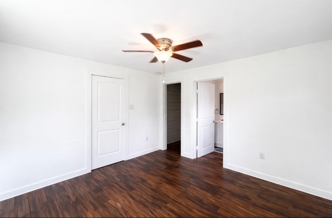 2117 Everett Street, Unit B Houston, TX 77009 - Photo 4 of 7 a view of an empty room with wooden floor