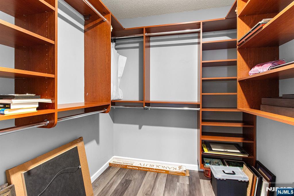 800 Palisade Avenue, Unit 2007 Fort Lee, NJ 07024 - Photo 18 of 21 a view of walk in closet with empty racks