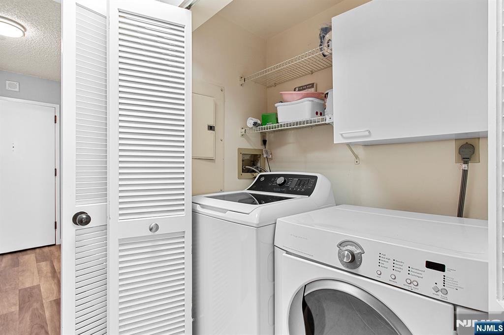 800 Palisade Avenue, Unit 2007 Fort Lee, NJ 07024 - Photo 19 of 21 a utility room with dryer and washer