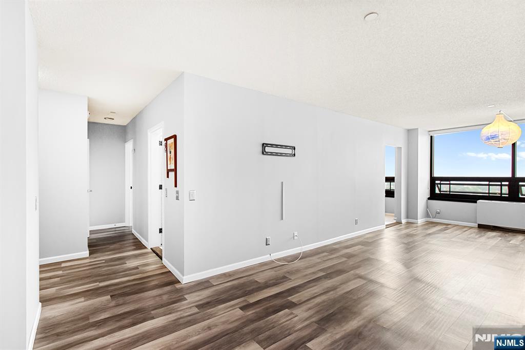 800 Palisade Avenue, Unit 2007 Fort Lee, NJ 07024 - Photo 7 of 21 a view of a room with an empty space