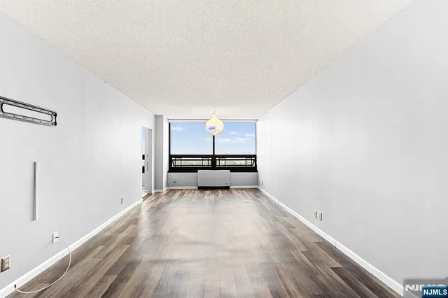 a view of a room with a sink and couch