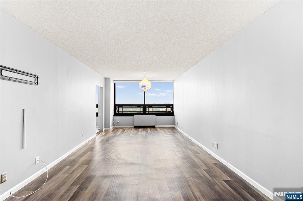 800 Palisade Avenue, Unit 2007 Fort Lee, NJ 07024 - Photo 9 of 21 a view of a room with a sink and couch