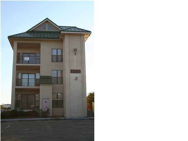 654 Harbor Boulevard, Unit 2 Destin, FL 32541 - Photo 1 of 14 a view of a house with a small entryway