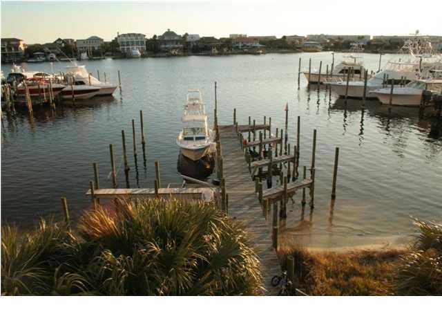 654 Harbor Boulevard, Unit 2 Destin, FL 32541 - Photo 11 of 14 a view of a lake with houses