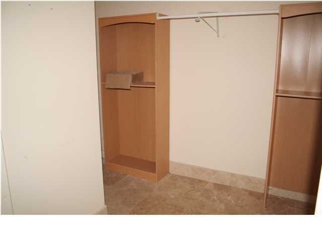 654 Harbor Boulevard, Unit 2 Destin, FL 32541 - Photo 3 of 14 a bathroom with a shower and a sink