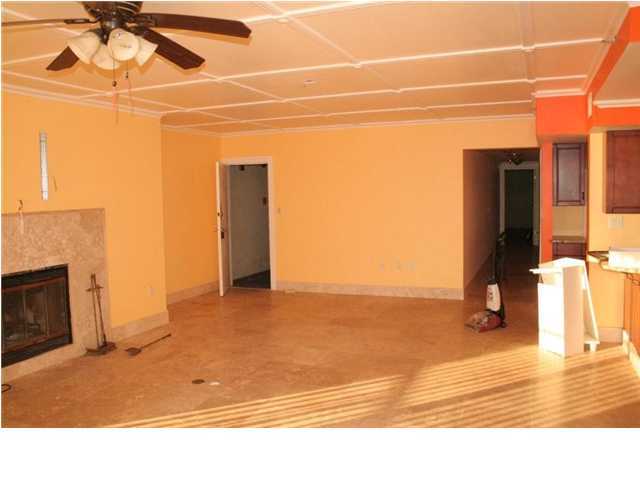 654 Harbor Boulevard, Unit 2 Destin, FL 32541 - Photo 6 of 14 a view of a livingroom with wooden floor