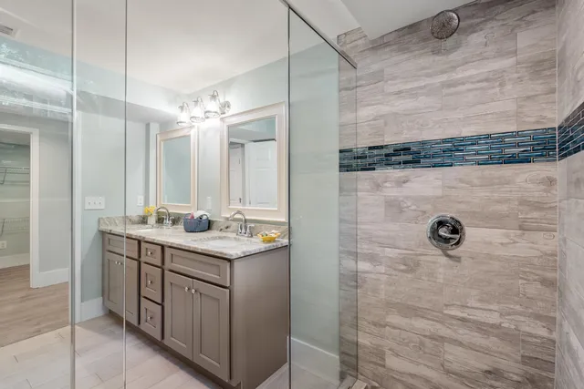 a utility room with sink dryer and washer