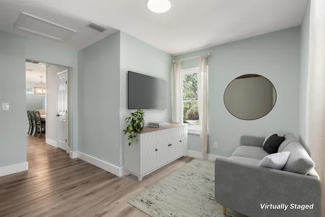 a view of house with a yard