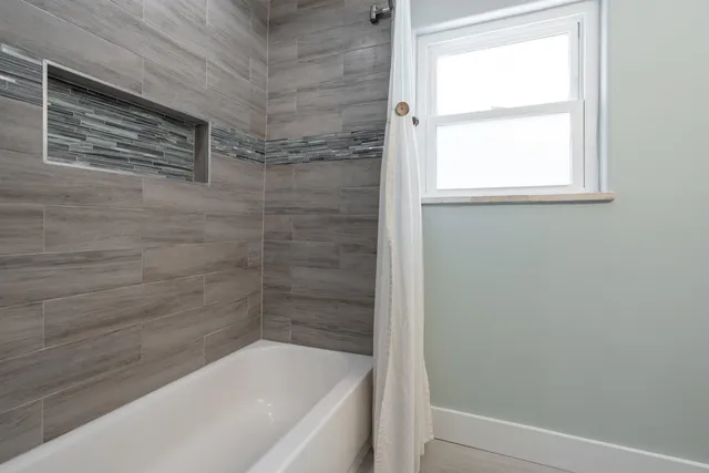 an aerial view of a city with lots of residential buildings