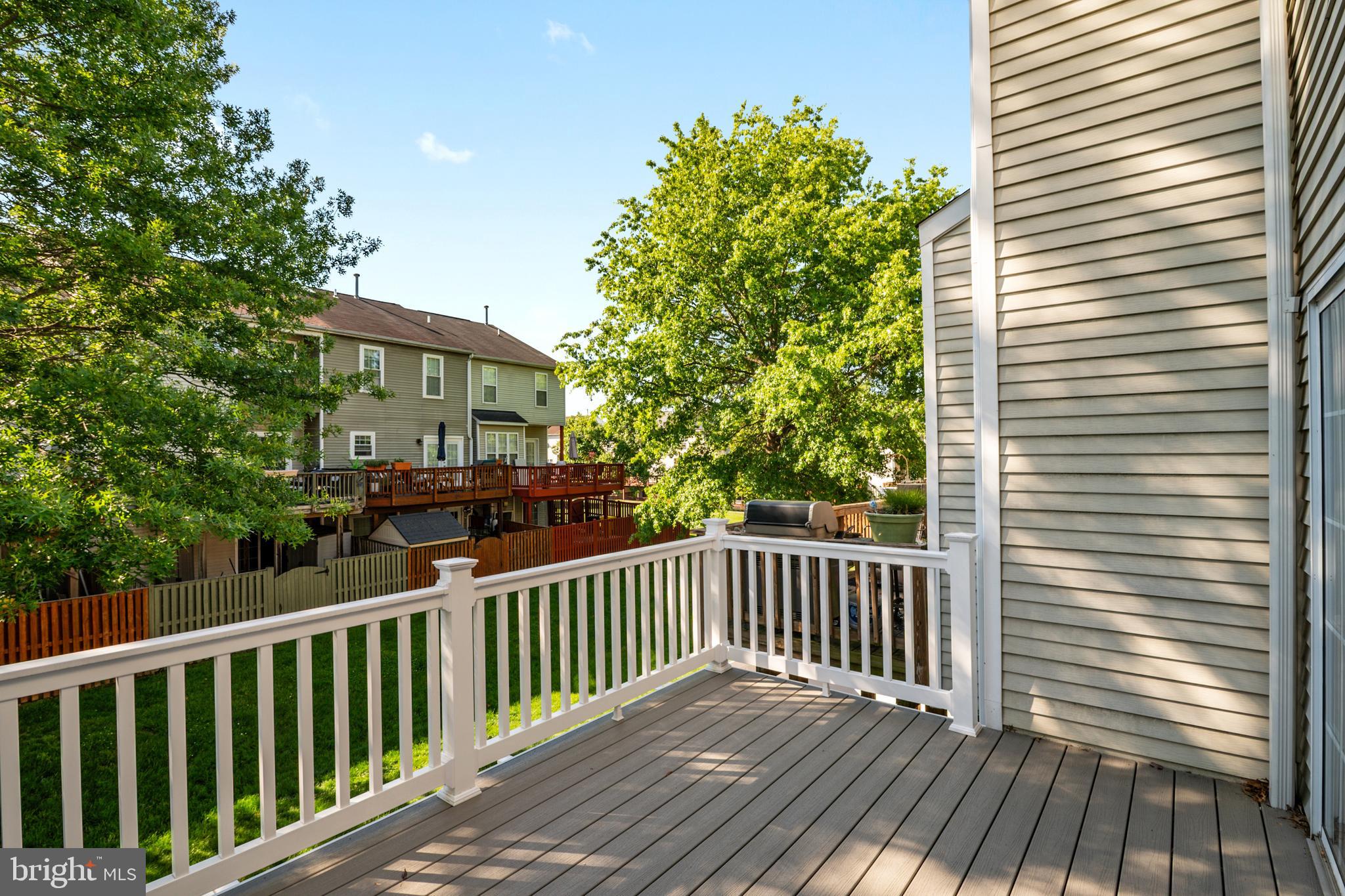 2333 Manomet Court Crofton, MD 21114 - Photo 14 of 44 a view of a wooden roof deck