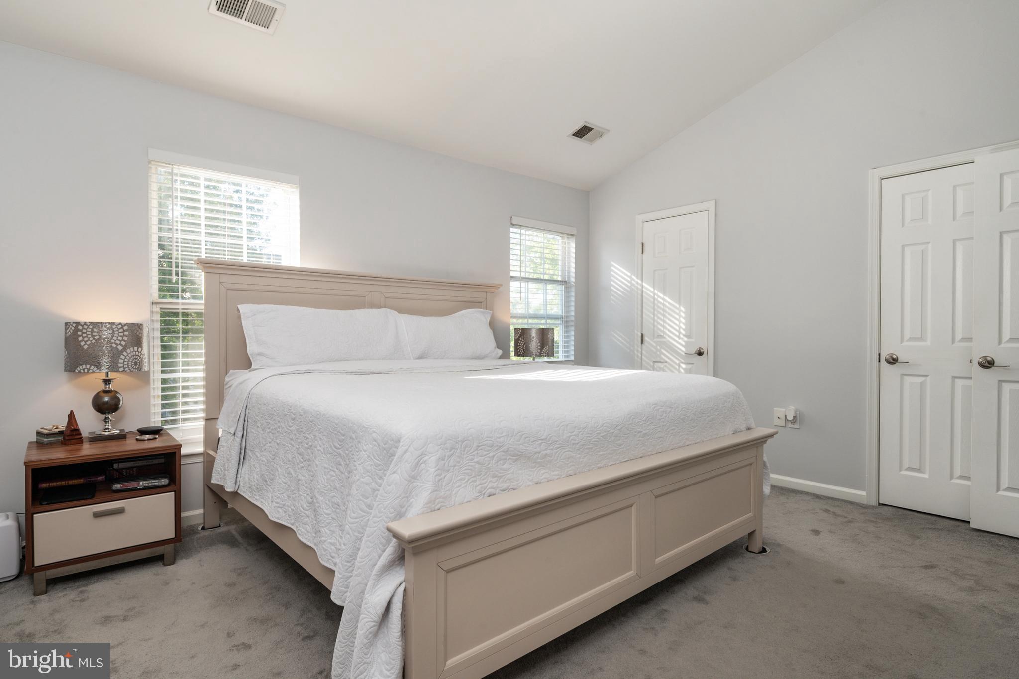 2333 Manomet Court Crofton, MD 21114 - Photo 18 of 44 a bedroom with a bed and a window