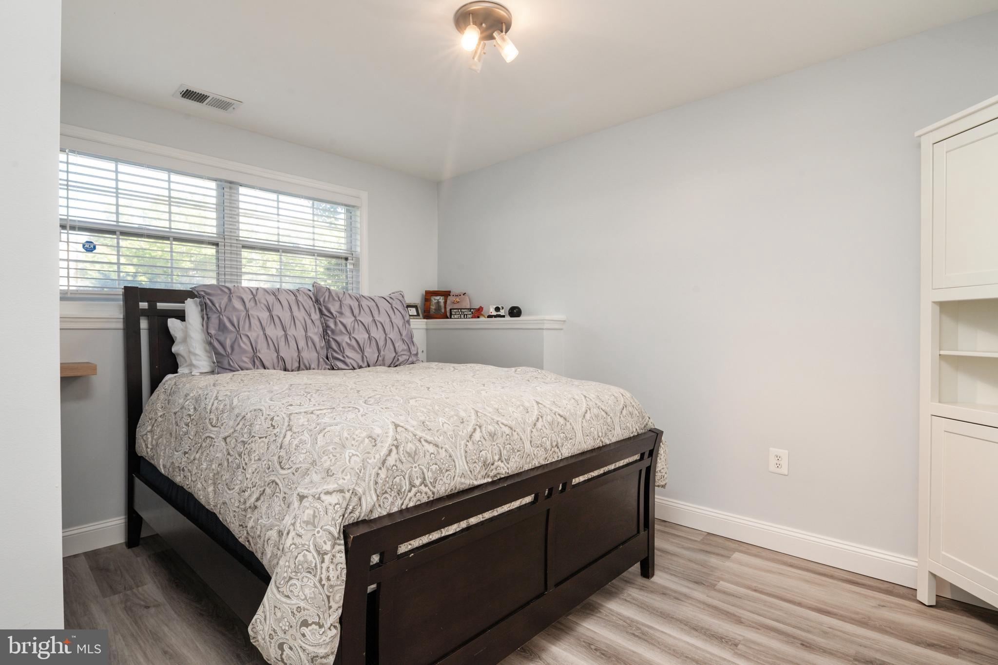 2333 Manomet Court Crofton, MD 21114 - Photo 29 of 44 a bedroom with a bed and window
