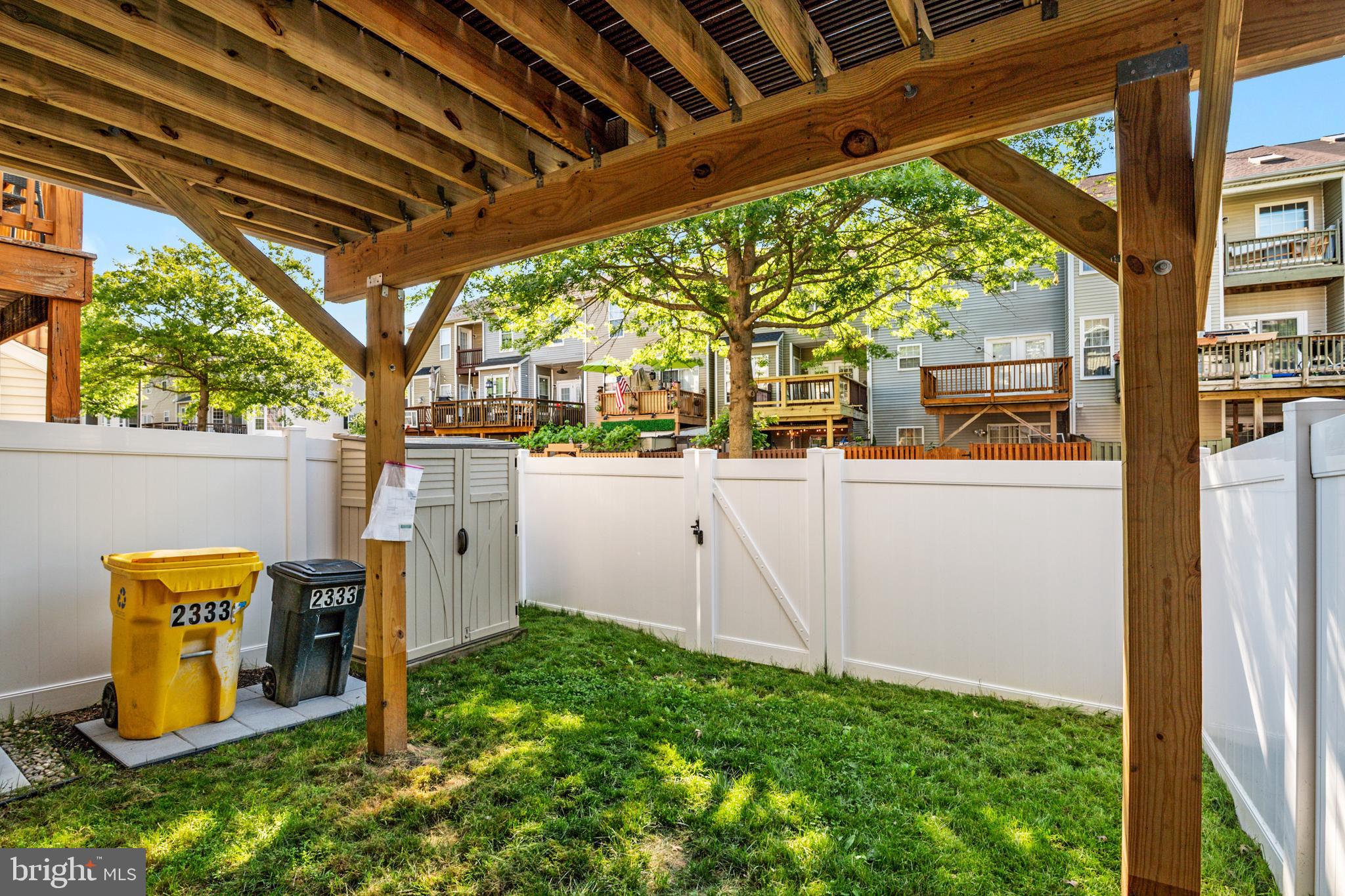 2333 Manomet Court Crofton, MD 21114 - Photo 30 of 44 a view of a backyard with garden