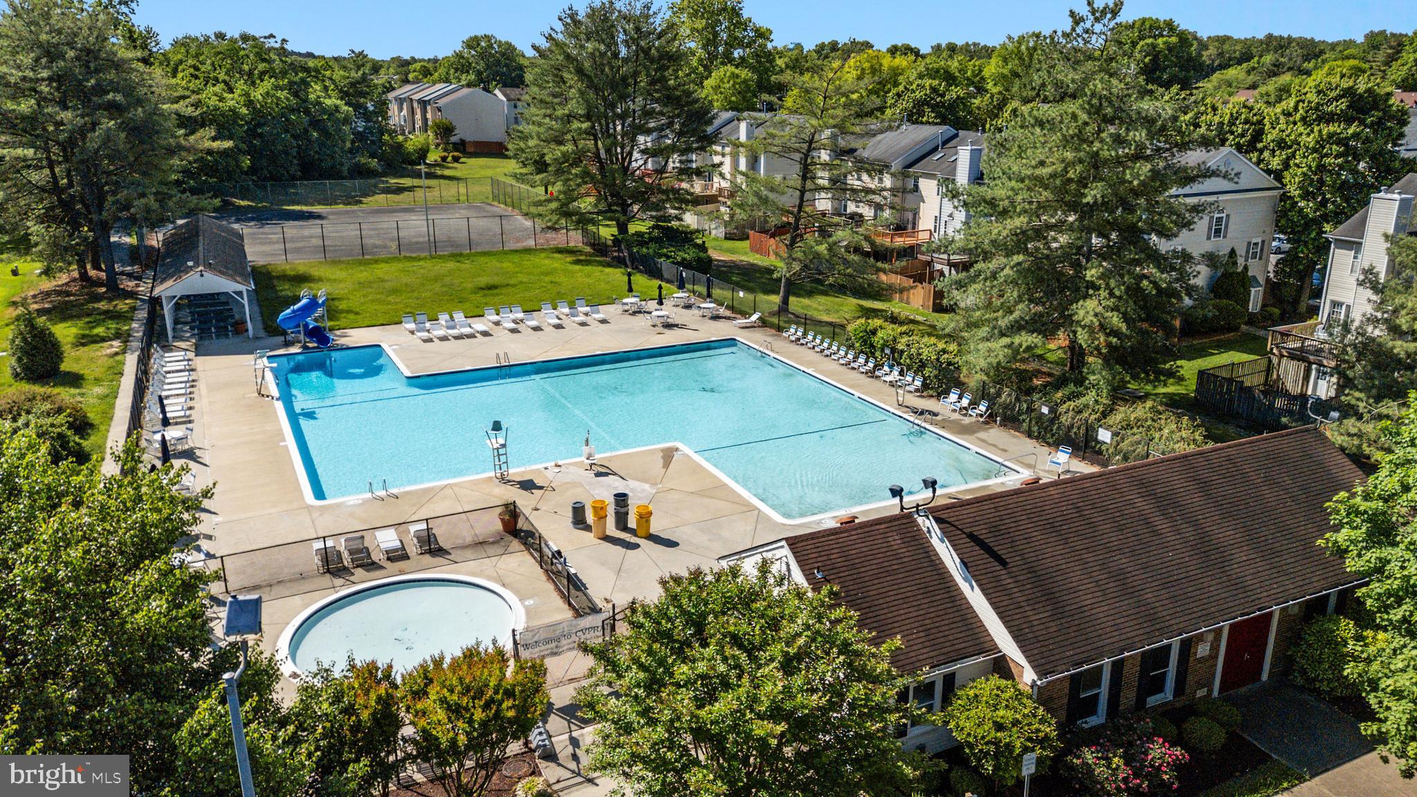 2333 Manomet Court Crofton, MD 21114 - Photo 44 of 44 an aerial view of a house with a swimming pool outdoor seating and yard
