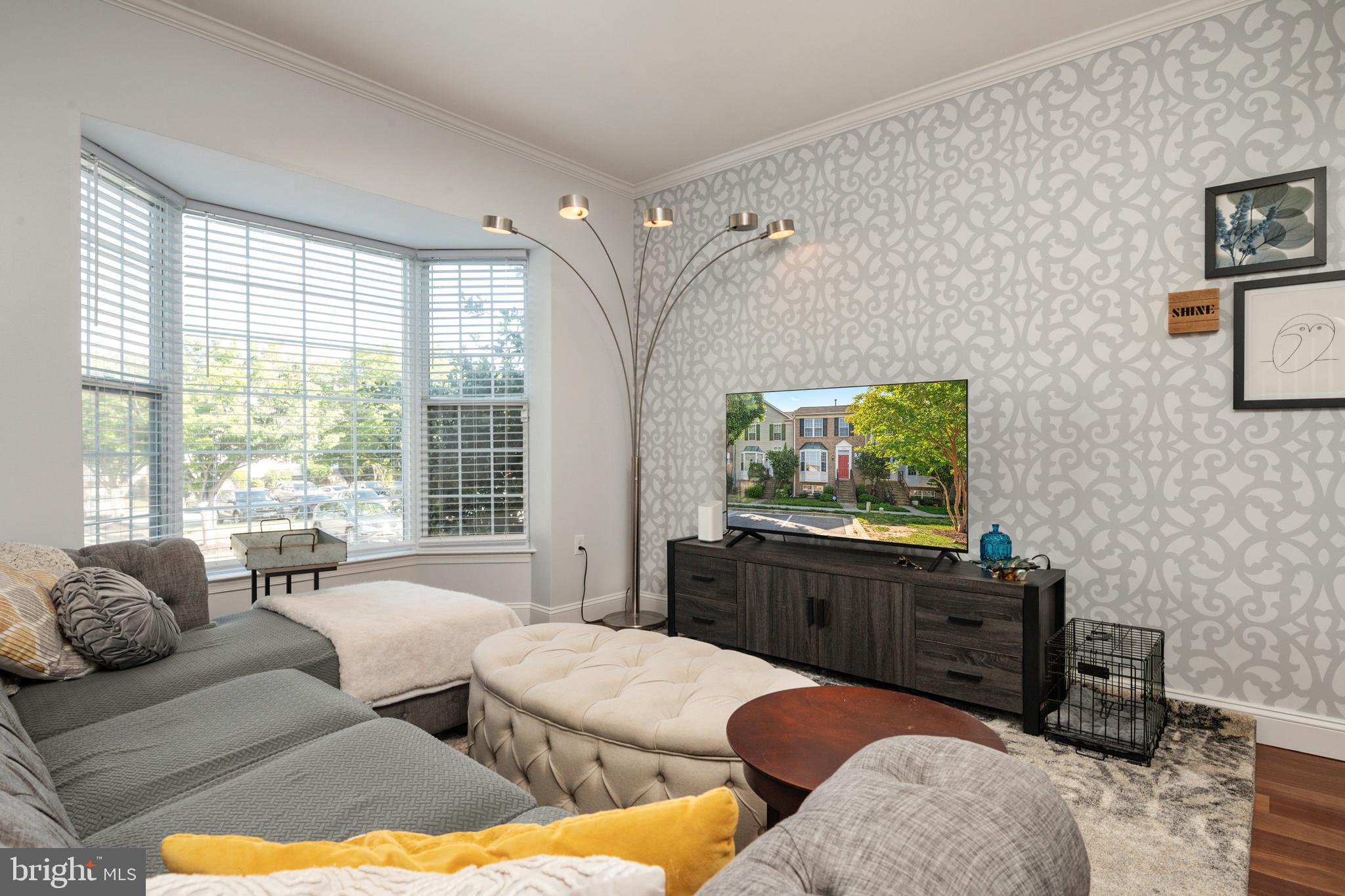 2333 Manomet Court Crofton, MD 21114 - Photo 5 of 44 a living room with furniture a flat screen tv and a window