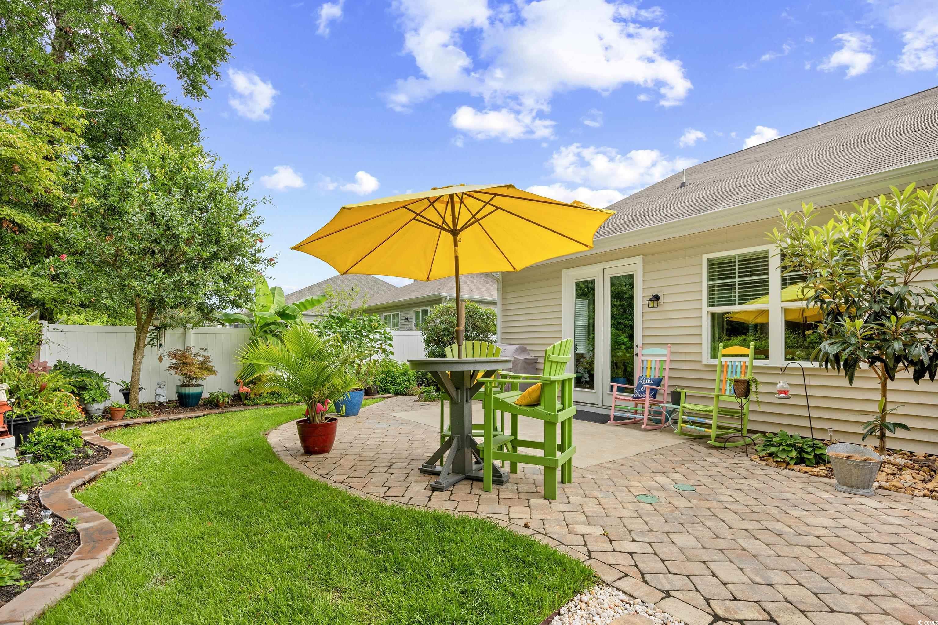 1104 Inlet View Drive North Myrtle Beach, SC 29582 - Photo 30 of 40 View of yard with a patio