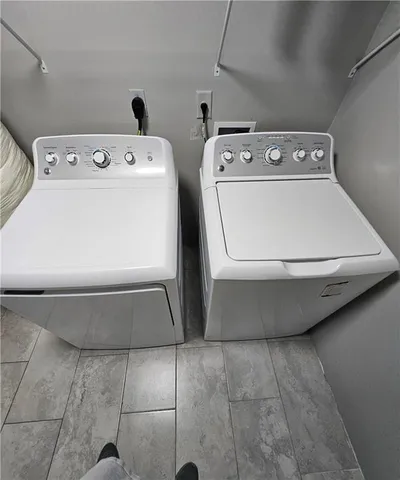a utility room with dryer and washer