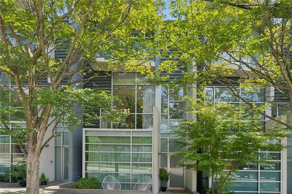 752 Moreland Avenue Southeast, Unit 4 Atlanta, GA 30316 - Photo 1 of 58 a view of a house with a tree