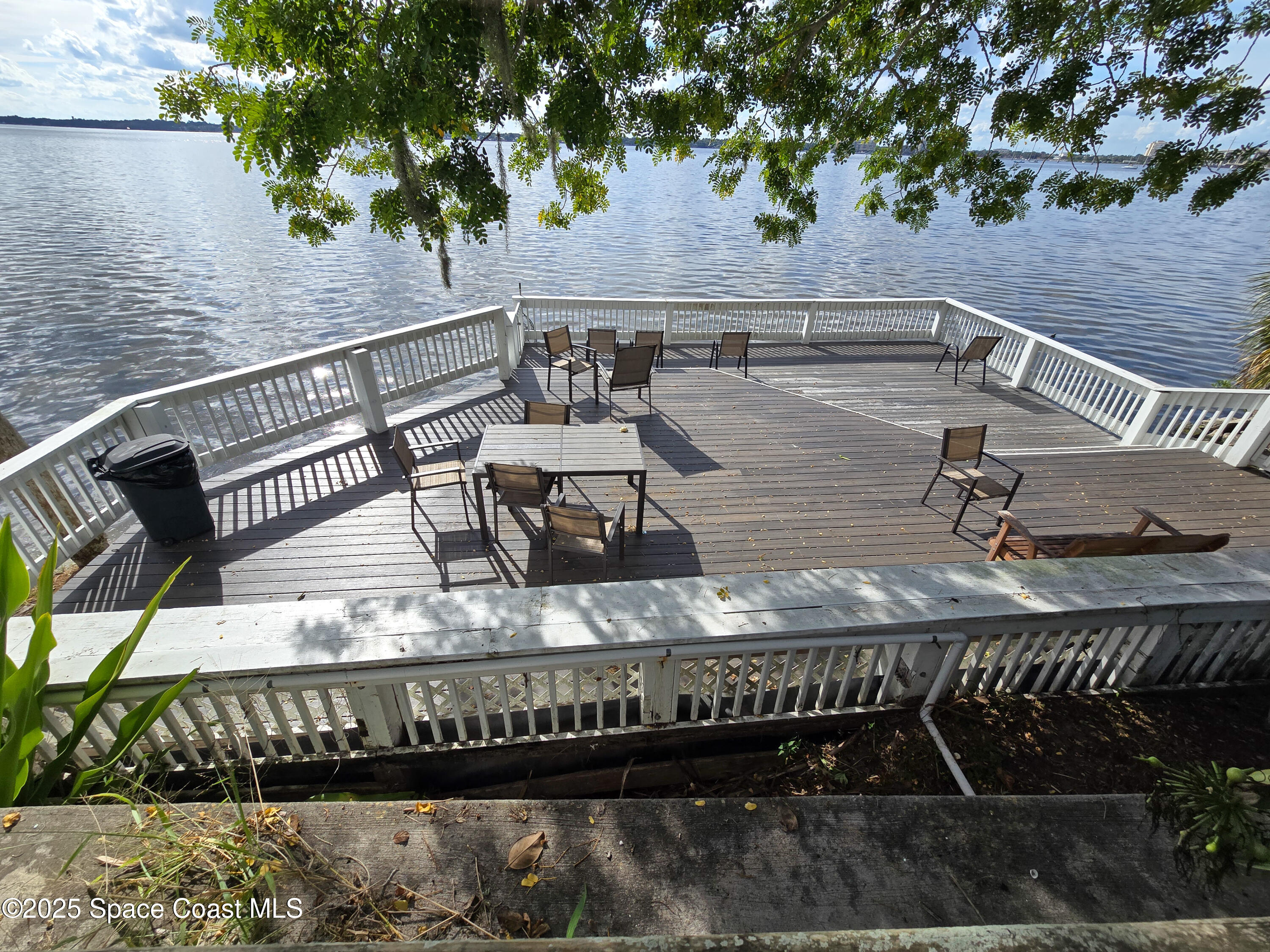 225 South Tropical Trail, Unit 217 Merritt Island, FL 32952 - Photo 15 of 18 a view of balcony with wooden floor