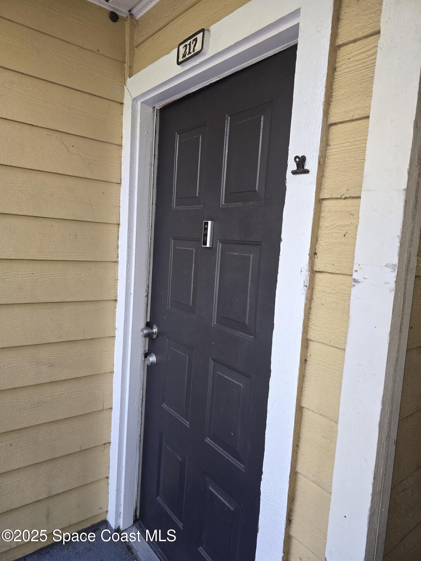 225 South Tropical Trail, Unit 217 Merritt Island, FL 32952 - Photo 3 of 18 a view of door