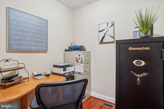 a room with furniture a rug and a window