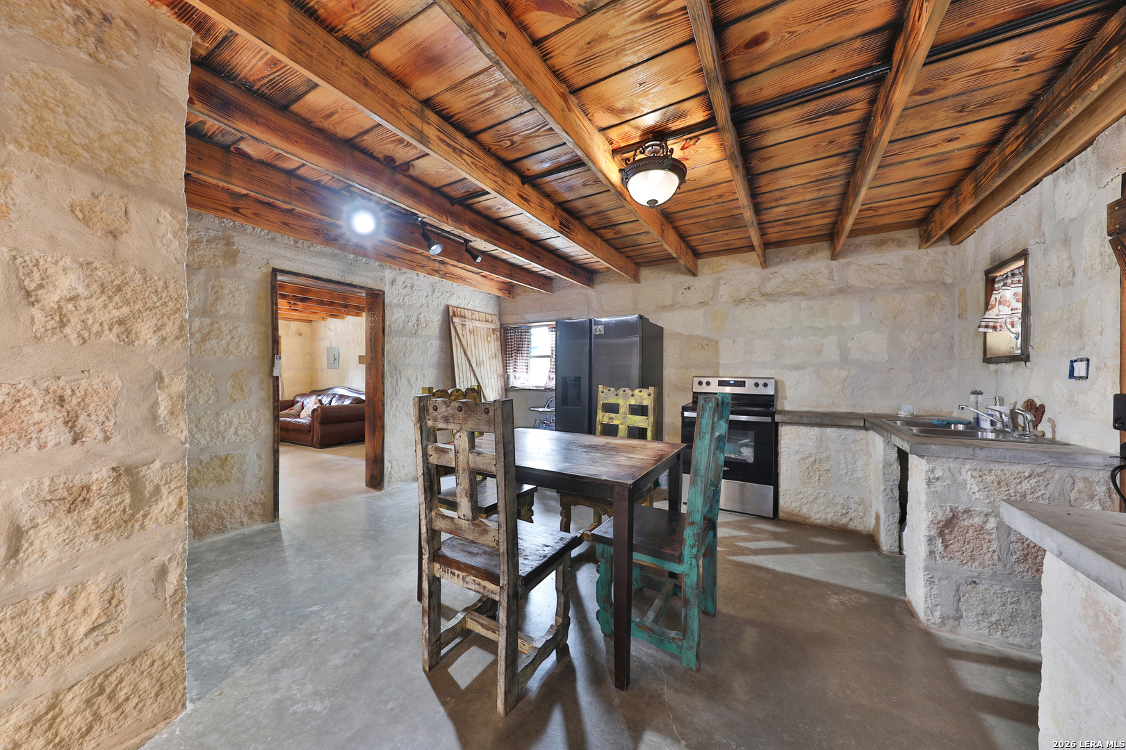 122 Brink Center Point, TX 78010 - Photo 7 of 40 a view of a kitchen and dining room