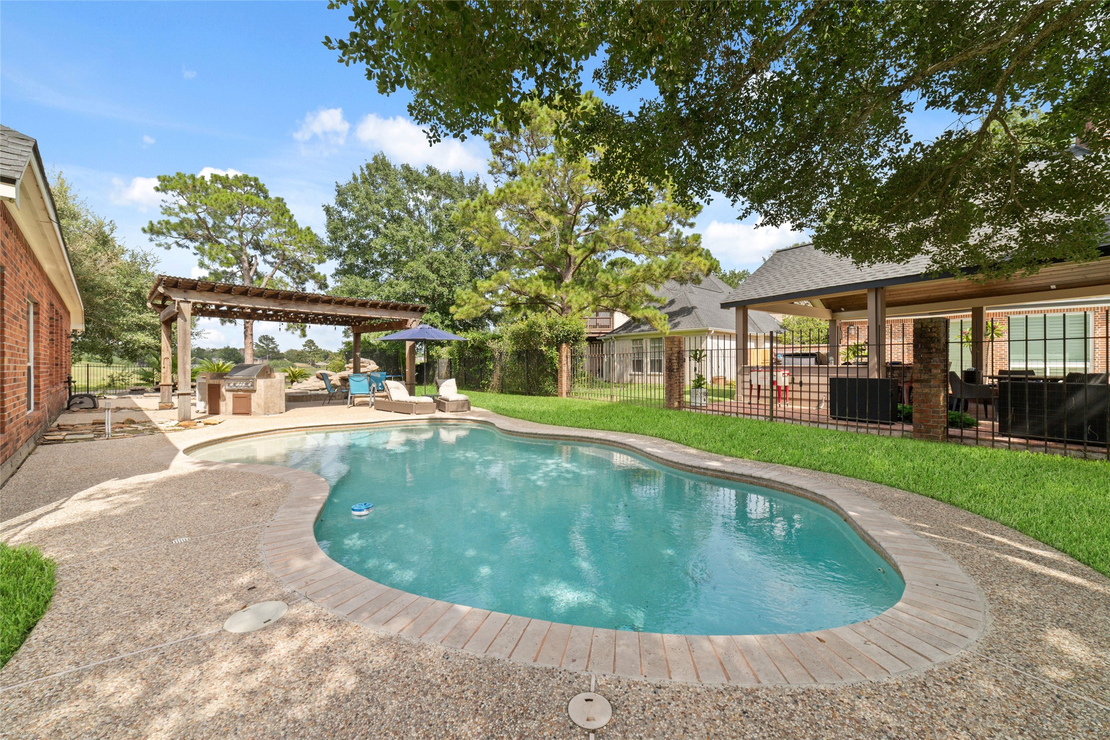 24203 Moon Ridge Court Katy, TX 77494 - Photo 35 of 43 Home is situated on an oversized lot so there's still plenty of green space to enjoy!