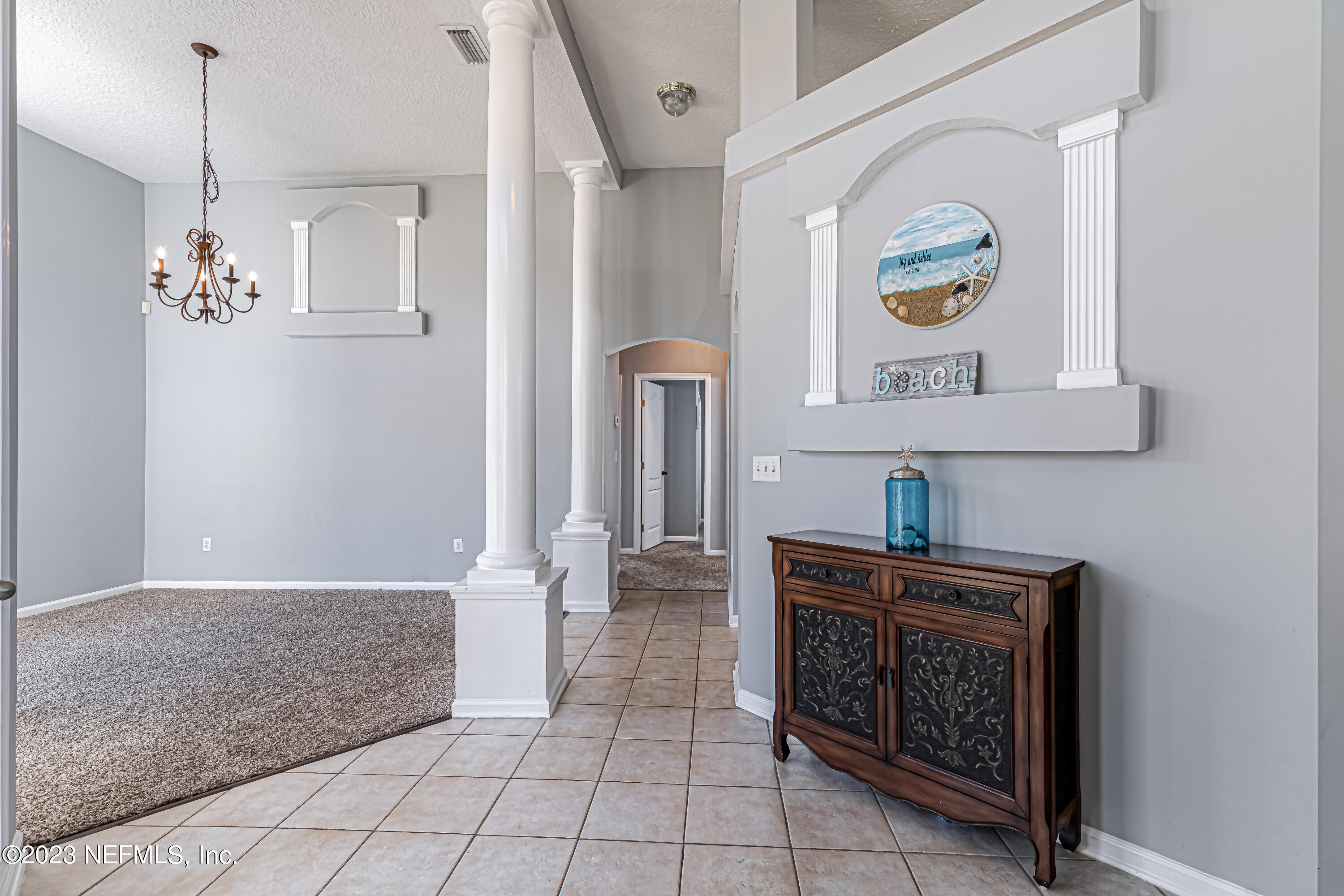 3795 Bedford Drive Middleburg, FL 32068 - Photo 11 of 54 a kitchen with stainless steel appliances granite countertop a stove and a refrigerator