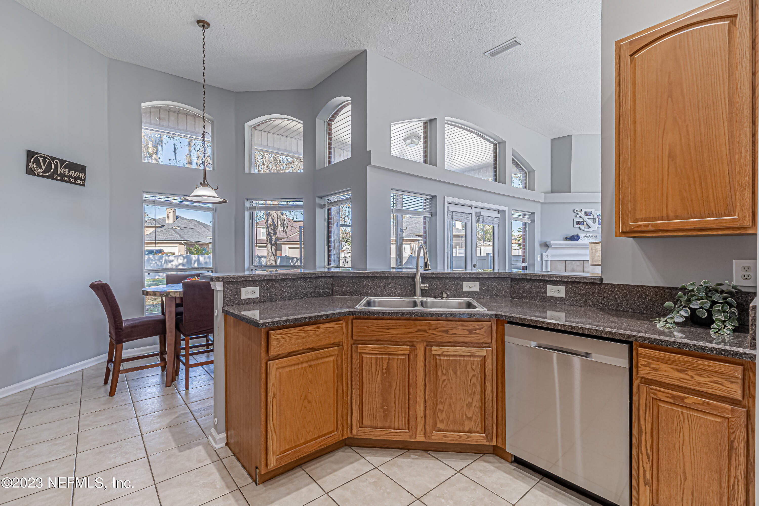 3795 Bedford Drive Middleburg, FL 32068 - Photo 15 of 54 a kitchen with a sink and cabinets