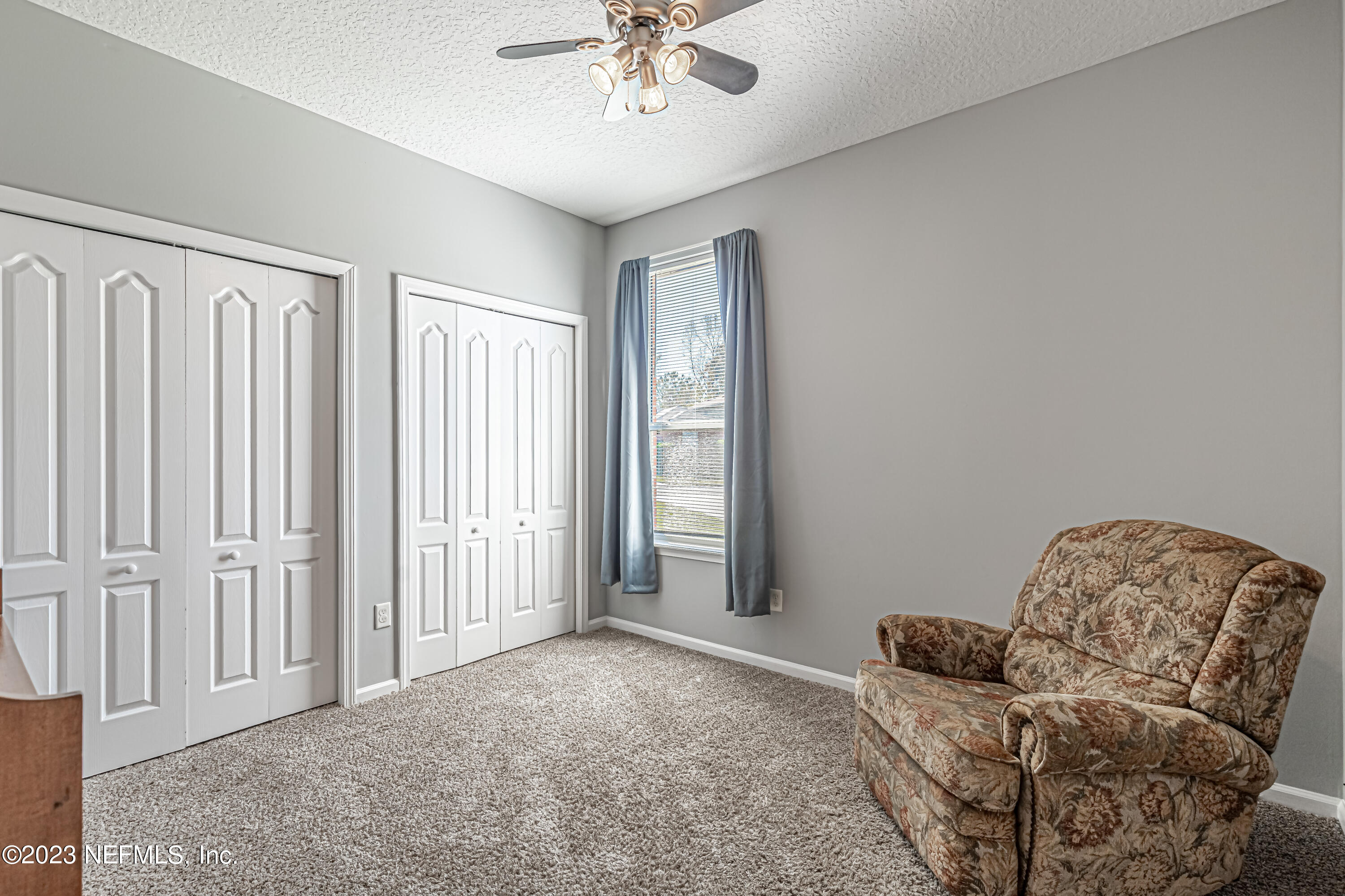 3795 Bedford Drive Middleburg, FL 32068 - Photo 22 of 54 a living room with furniture and a window