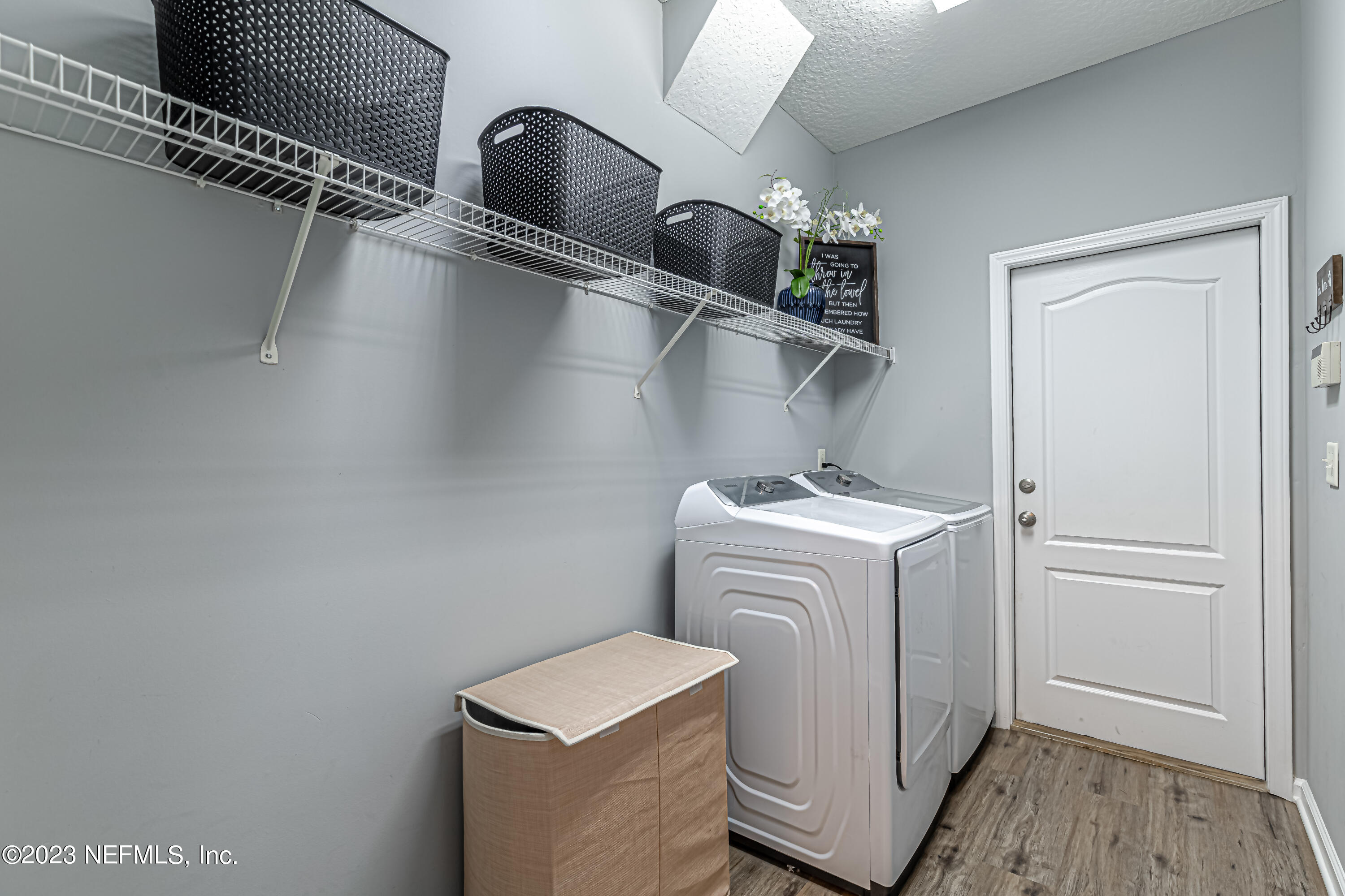3795 Bedford Drive Middleburg, FL 32068 - Photo 24 of 54 a utility room with dryer and washer