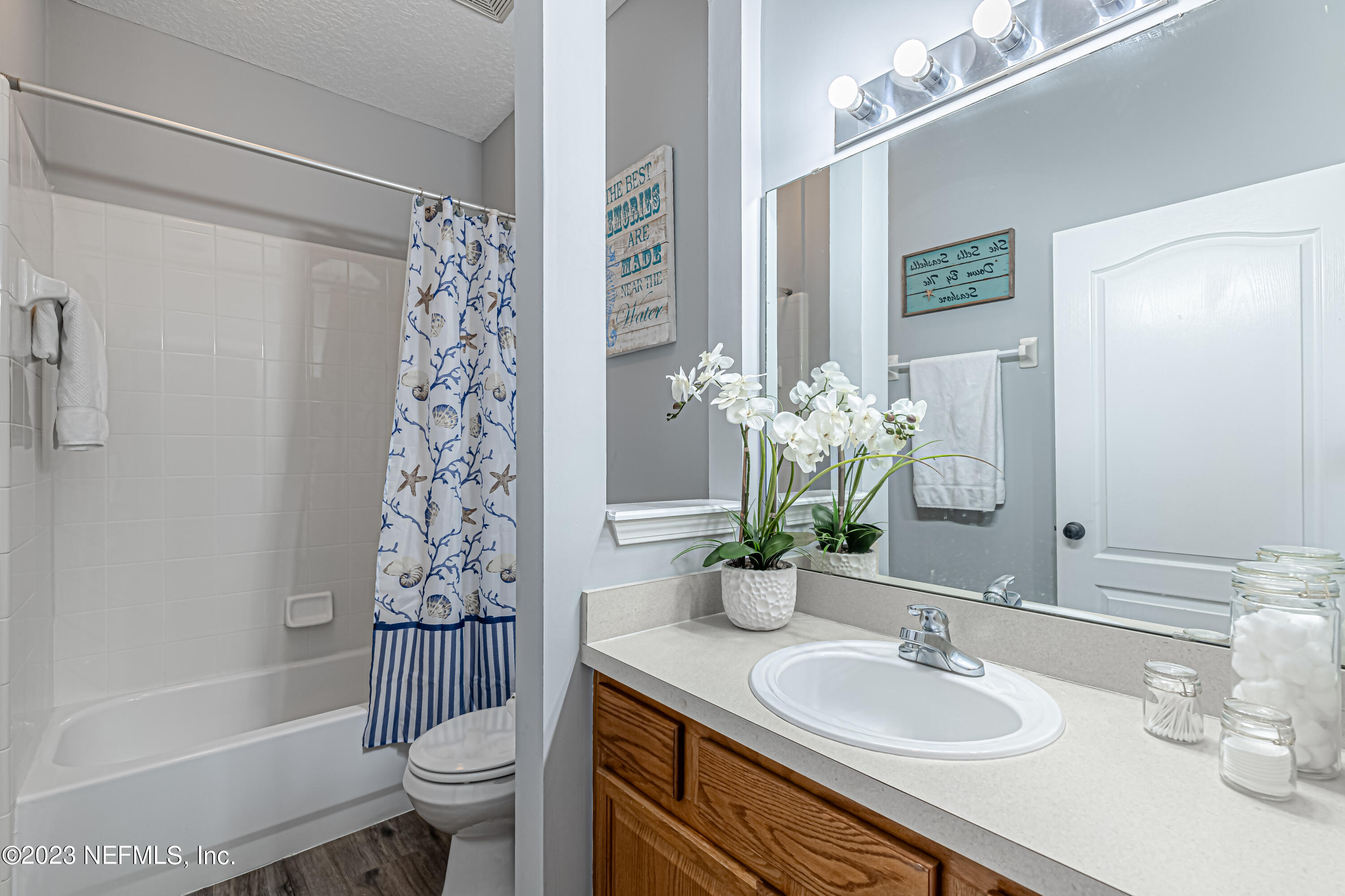 3795 Bedford Drive Middleburg, FL 32068 - Photo 25 of 54 a bathroom with a sink toilet and shower