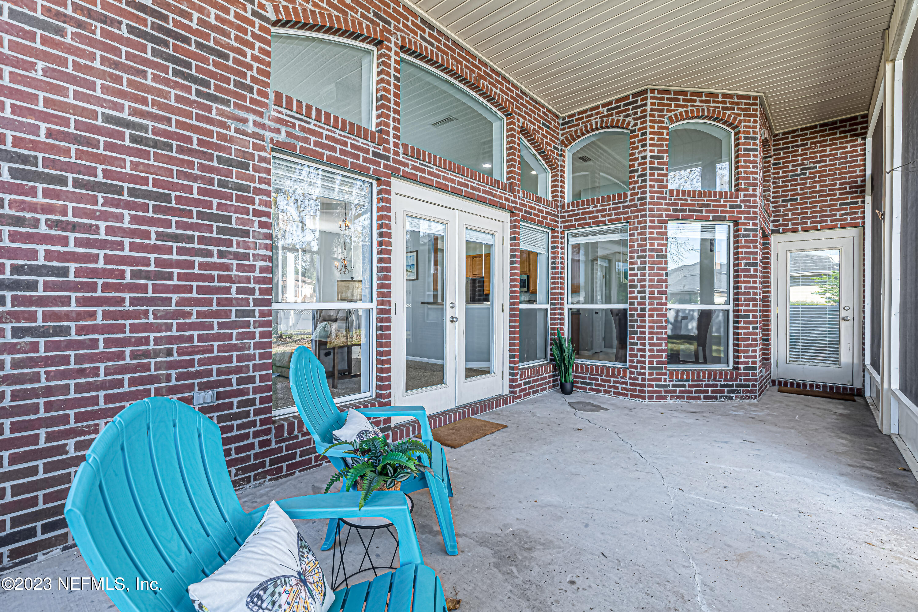 3795 Bedford Drive Middleburg, FL 32068 - Photo 35 of 54 a view of a brick house with many windows