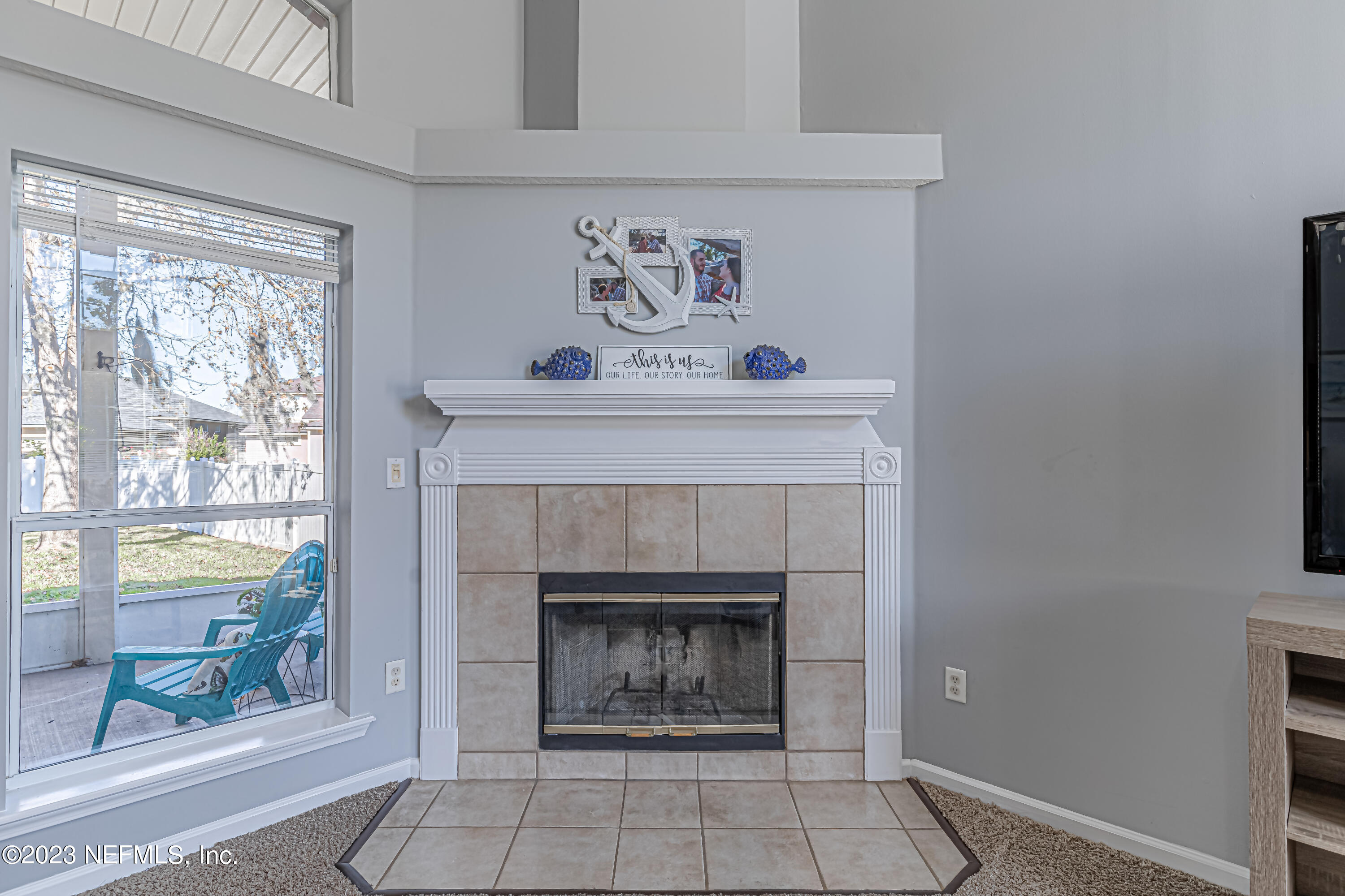 3795 Bedford Drive Middleburg, FL 32068 - Photo 9 of 54 a living room with furniture and a fireplace